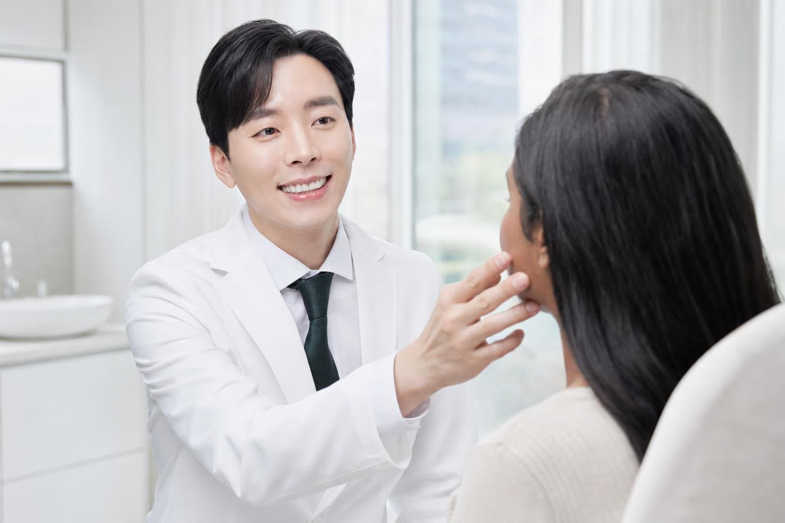 Dr. Min Jeong with a patient at REDI Dermatology in Seoul, discussing skin booster aftercare korea