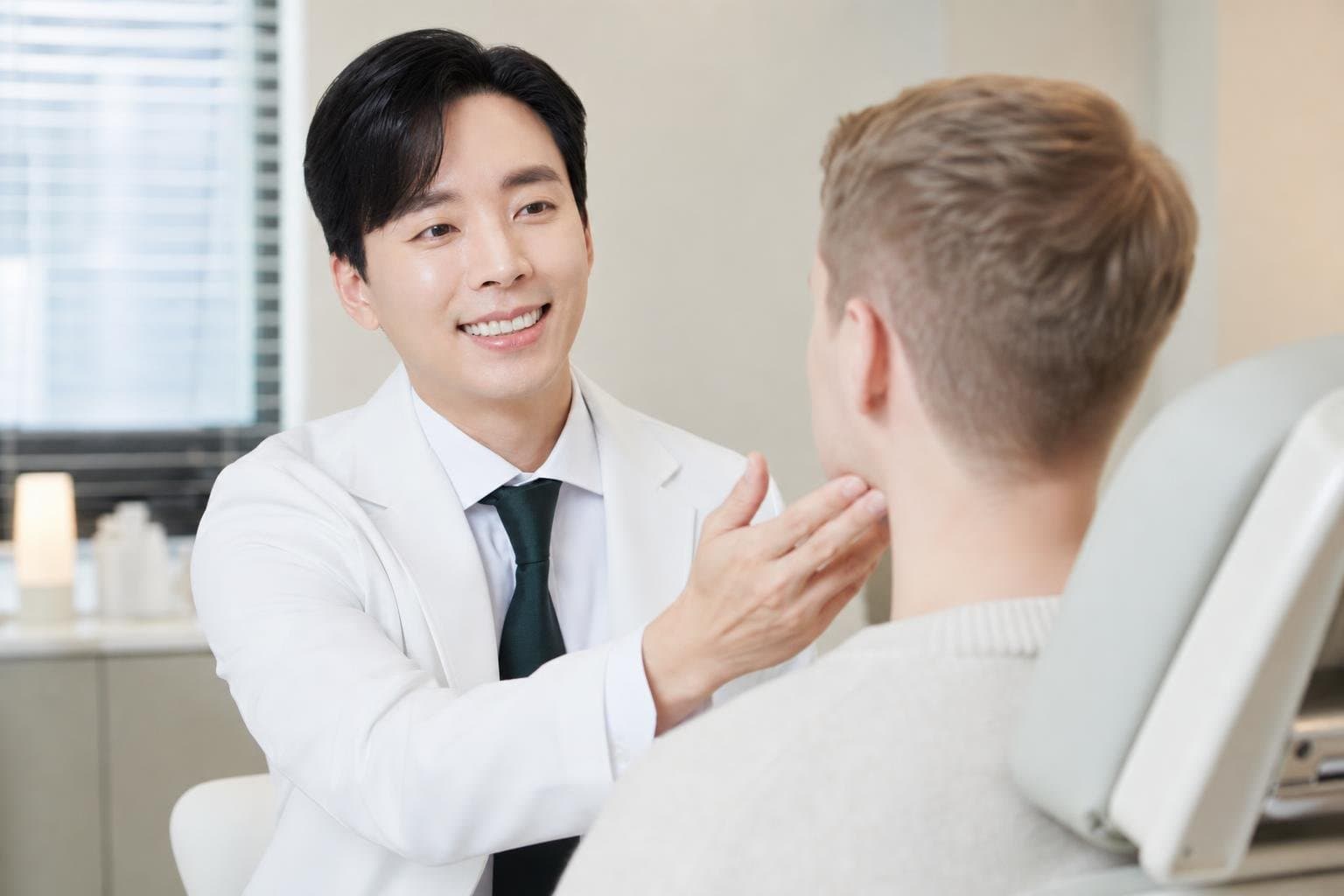 Dr. Min Jeong with a patient at REDI Dermatology in Seoul, discussing ultherapy vs sofwave